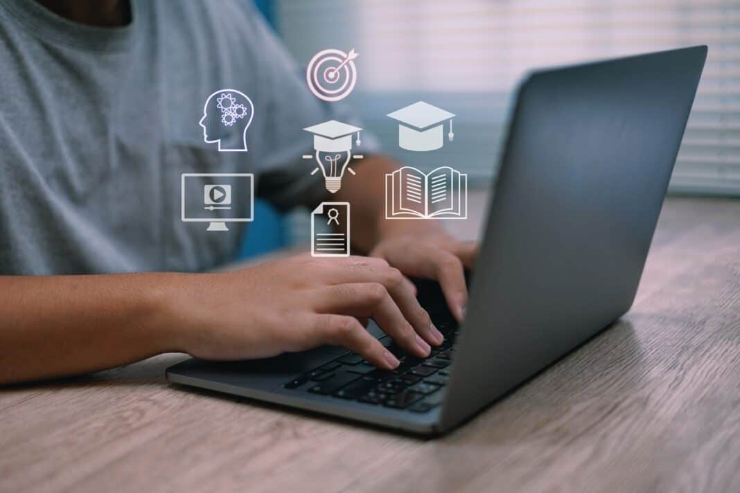 Young,Adult,Gen,Z,Sitting,On,Chair,Using,Laptop,Learning