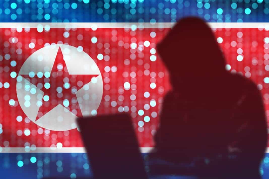 North,Korea,Flag.,Hacker,Silhouette.,Cyber,Criminal,With,Laptop.,Hacker