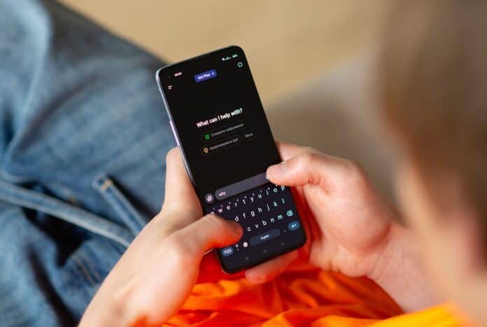 Close-up,Of,A,Person,Using,A,Smartphone,With,The,Chatgpt